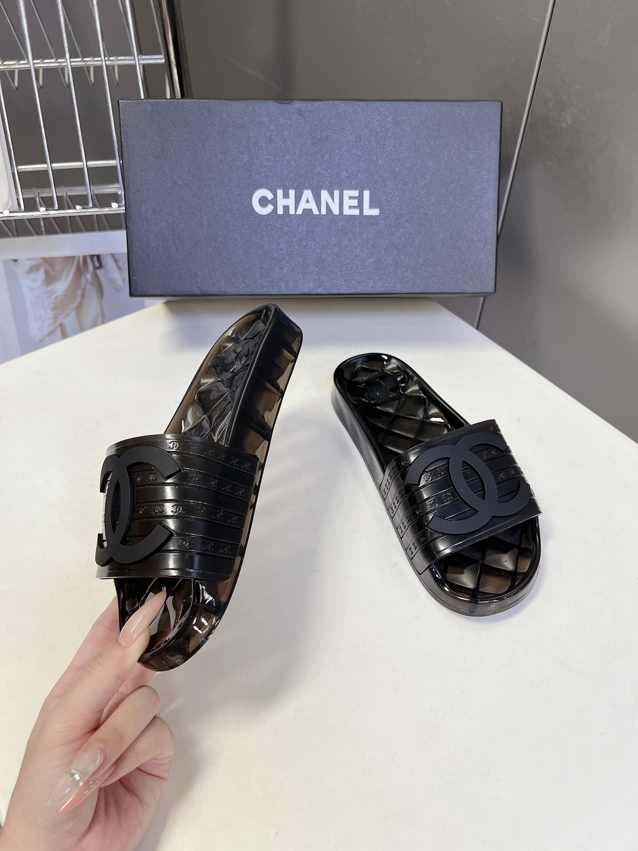 CHANEL 26S SLIDES IN BLACK PVC