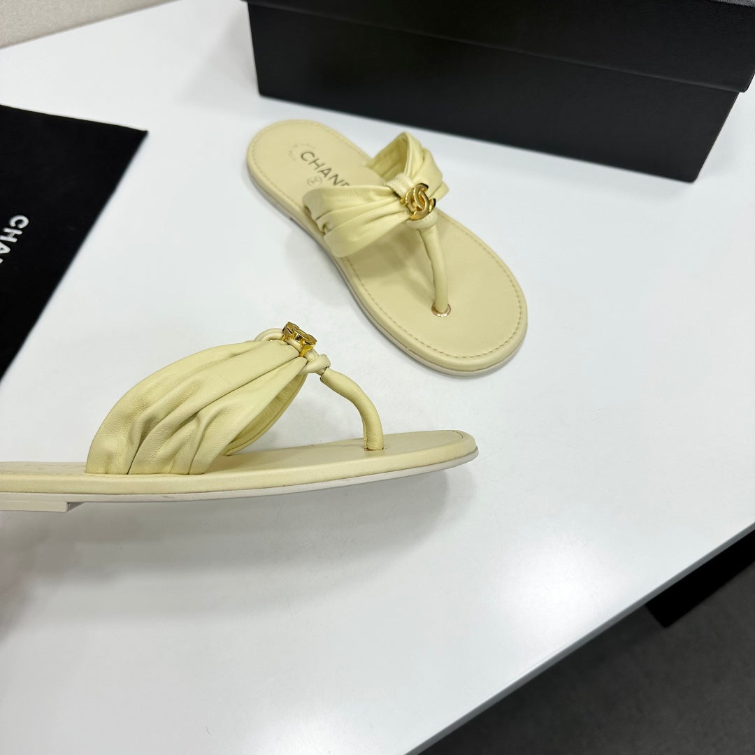 CHANEL 26S THONG SANDALS IN LIGHT YELLOW LAMBSKIN