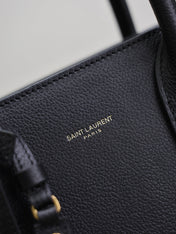 YSL 25S SAC DE JOUR GM 32 IN BLACK SUPPLE GRAINED CALFSKIN GOLD HARDWARE