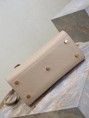 YSL 25S SAC DE JOUR GM 32 IN DARK BEIGE SUPPLE GRAINED CALFSKIN