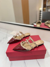 VALENTINO 26S STUDDED FLAT MULES IN DARK RED PATENT CALFSKIN