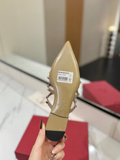 VALENTINO 26S STUDDED FLAT MULES IN BEIGE PINK PATENT CALFSKIN
