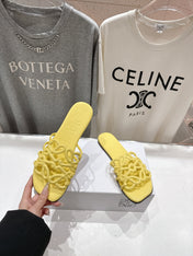 LOEWE 26S PETAL ANAGRAM SLIDE IN YELLOW CALFSKIN