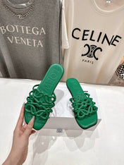 LOEWE 26S PETAL ANAGRAM SLIDE IN GREEN CALFSKIN