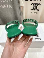 LOEWE 26S PETAL ANAGRAM SLIDE IN GREEN CALFSKIN