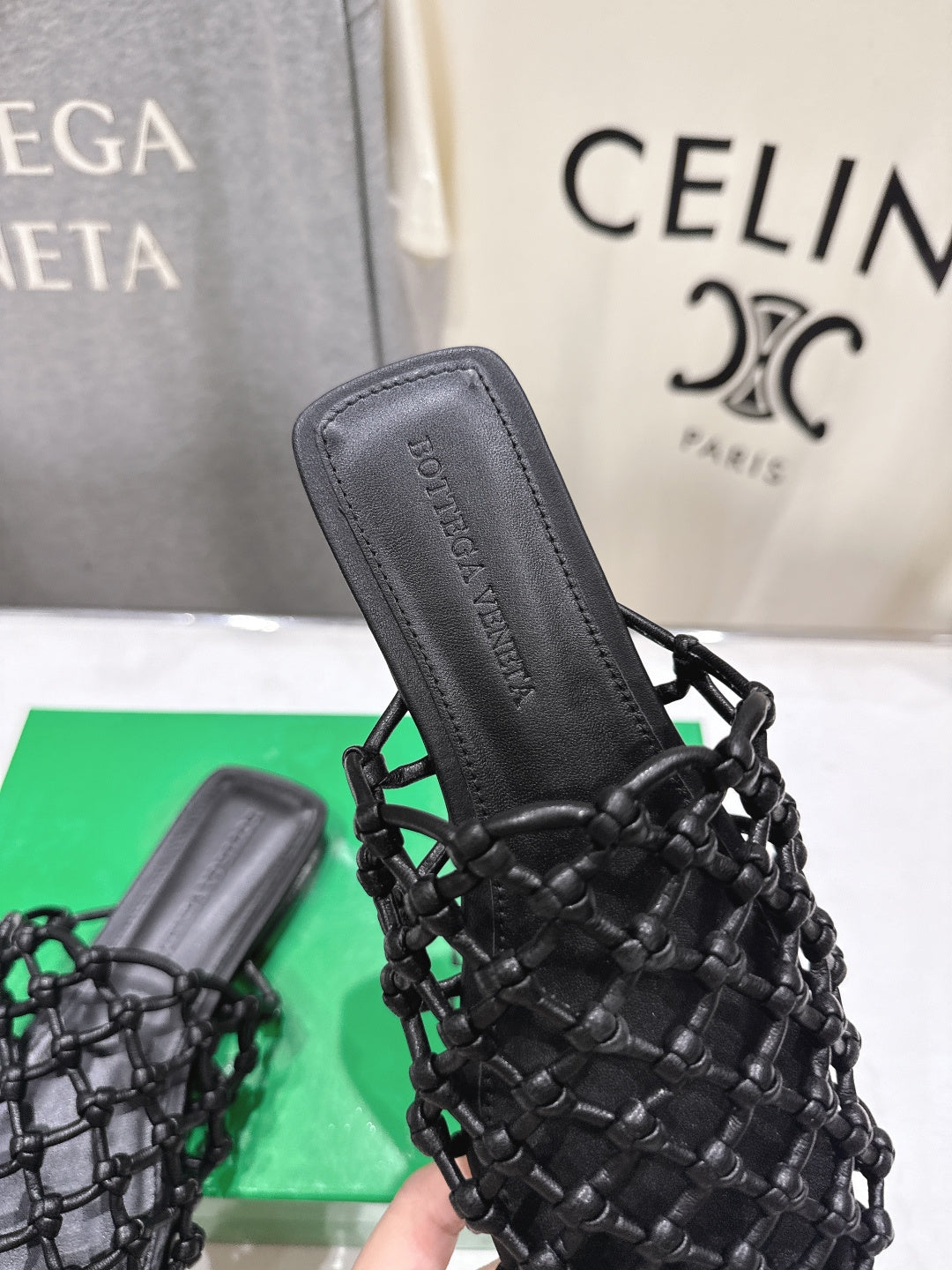 BOTTEGA VENETA 26S WOVEN MULES IN BLACK LAMBSKIN