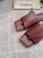 BOTTEGA VENETA 26S FLAT THONG SANDALS IN DARK RED LAMBSKIN