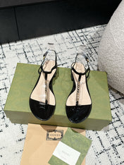 THONG SANDAL IN BLACK CALFSKIN WITH GOLD HARDWARE