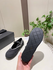 CHANEL 26S MARY JANE FLAT IN BLACK FABRIC AND LAMBSKIN