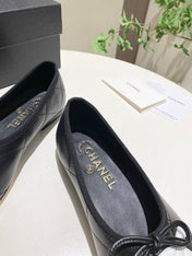 CHANEL 26S FLATS IN BLACK LAMBSKIN WITH BOW