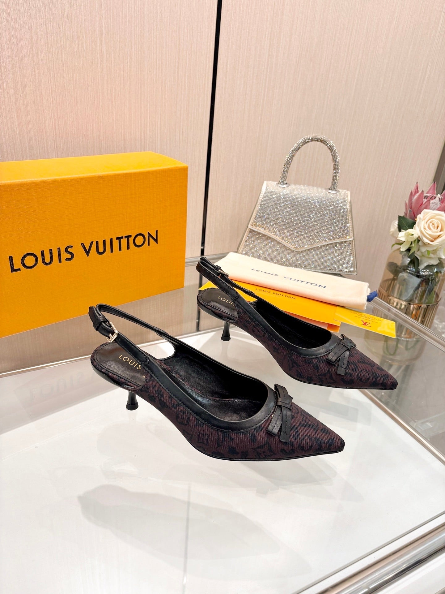 LV 26S BOW-DETAIL SLINGBACK PUMPS 55 MM IN MUTED PLUM BROWN MONOGRAM CANVAS