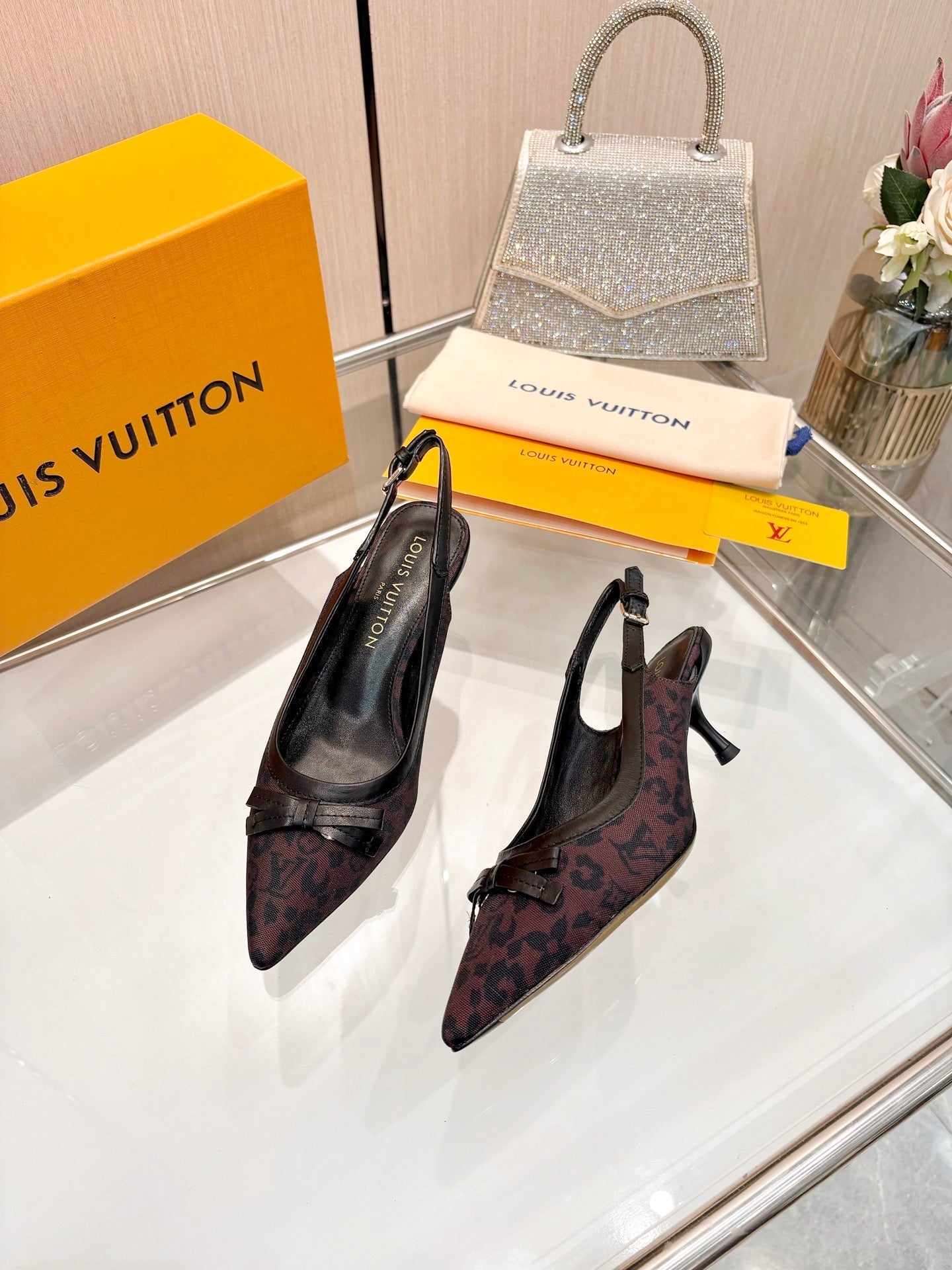 LV 26S BOW-DETAIL SLINGBACK PUMPS 55 MM IN MUTED PLUM BROWN MONOGRAM CANVAS
