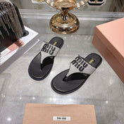 MIUMIU 26S THONG SANDALS IN WHITE CANVAS AND BLACK CALFSKIN LOGO