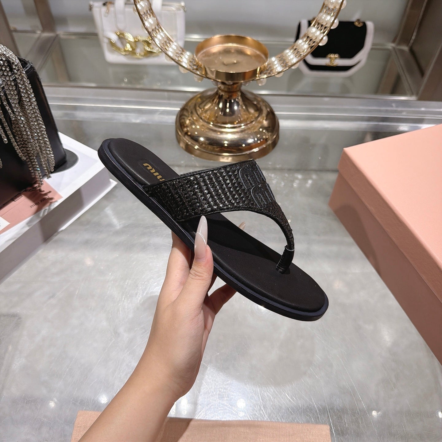 MIUMIU 26S THONG SANDALS IN BLACK RAFFIA CALFSKIN EMBOSSED LOGO