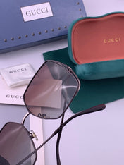 GUCCI 26S SQUARE FRAME IN METAL 426567