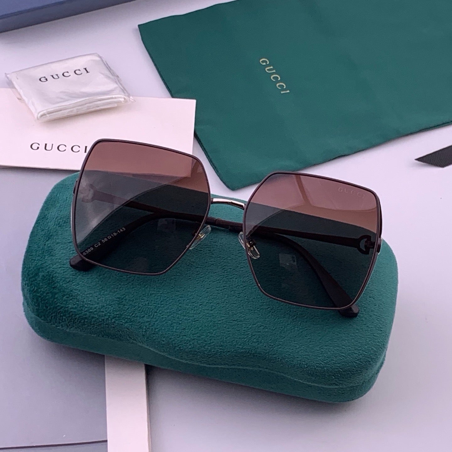 GUCCI 26S SQUARE FRAME IN METAL 426567
