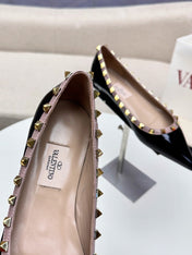 ROCKSTUD FLAT PUMP IN BLACK CALFSKIN