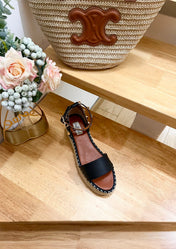 ROCKSTUD FLATFORM SANDAL IN BLACK CALFSKIN