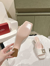 CRYSTAL HEEL MULE IN WHITE SHINY CALFSKIN WITH EMBELLISHED BUCKLE