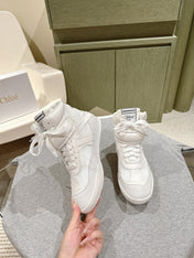 CHLOÉ 26S HIGH-TOP SNEAKERS IN WHITE CALFSKIN AND SUEDE