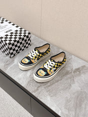 VALENTINO 25S GARAVANI X VANS SNEAKERS IN YELLOW MIX BLACK CANVAS
