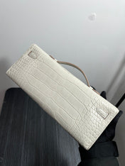 KELLY CUT 31 IN WHITE SHINNY ALLIGATOR LEATHER WITH GOLD HARDWARE