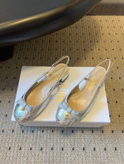 DIOR 26S OPEN BACK SANDALS IN SILVER CALFSKIN WITH PEARL BOW