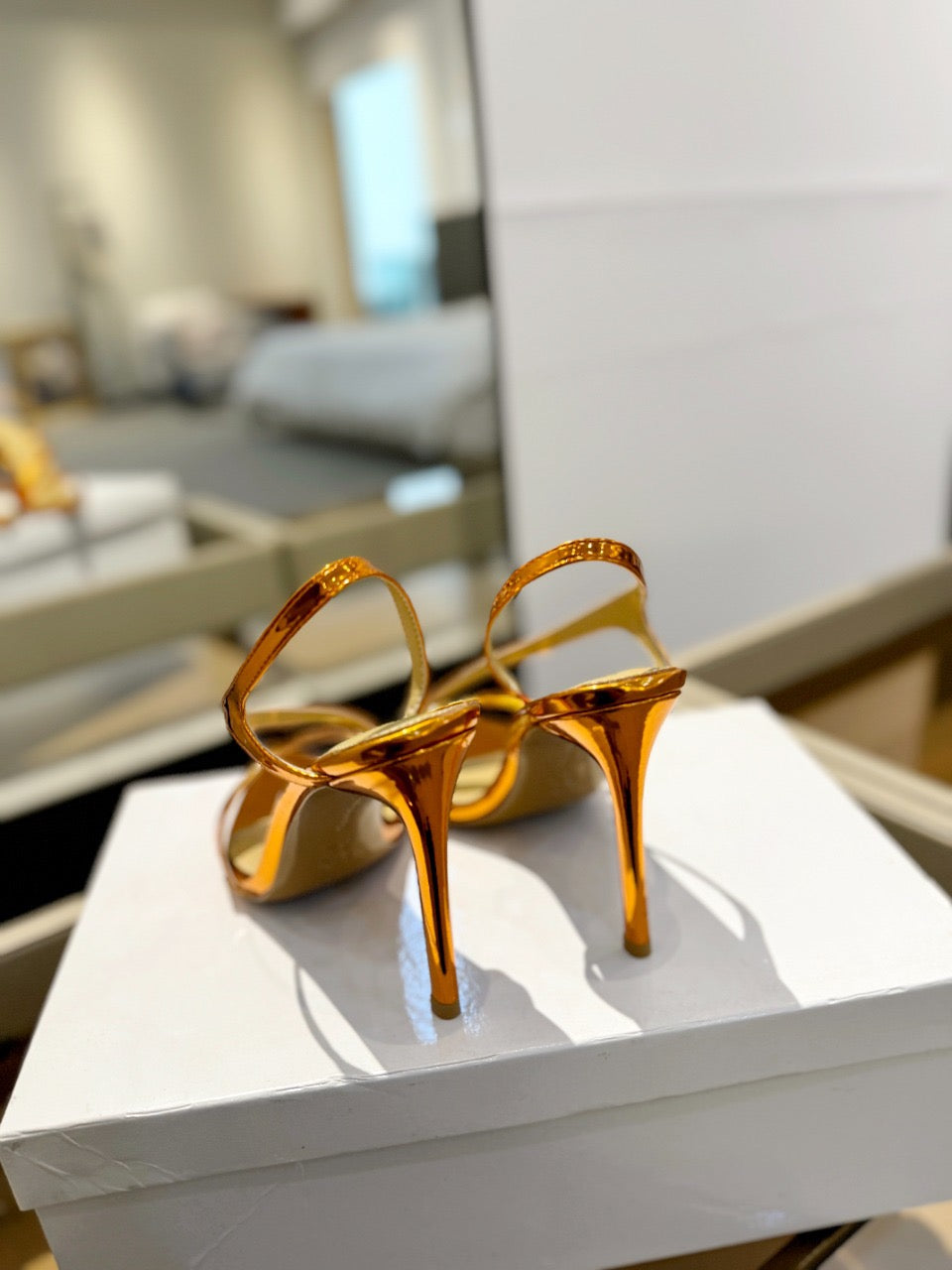 GIANVITO ROSSI 26S STRAPPY HIGH-HEEL SANDALS 105 MM IN METALLIC ORANGE GOLD PATENT CALFSKIN