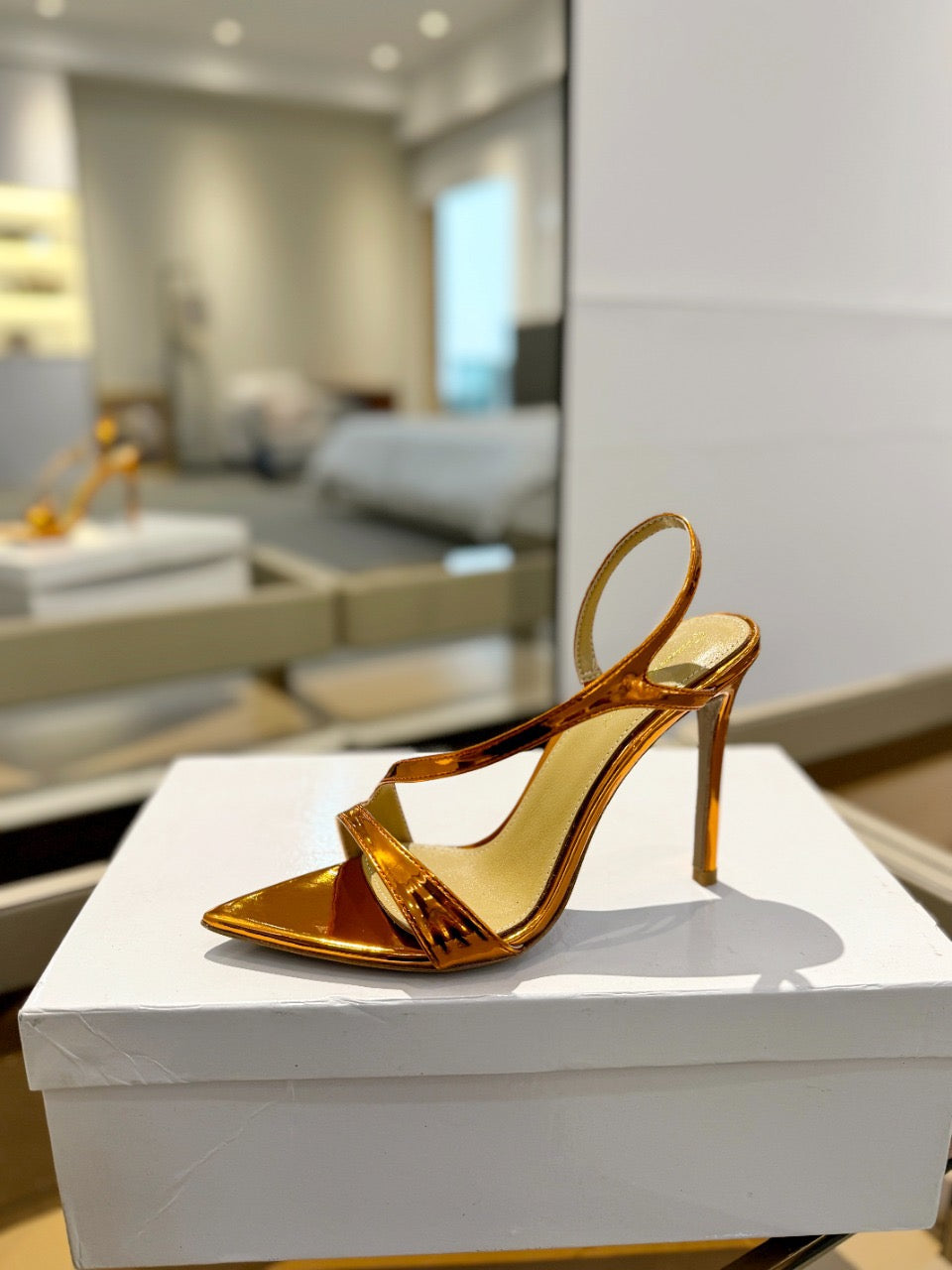 GIANVITO ROSSI 26S STRAPPY HIGH-HEEL SANDALS 105 MM IN METALLIC ORANGE GOLD PATENT CALFSKIN