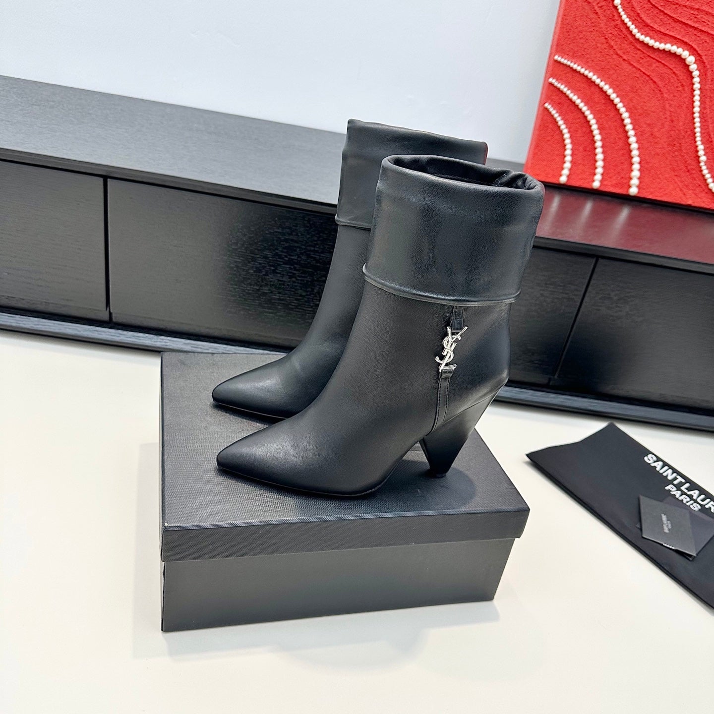 YSL 26S FOLD-OVER ANKLE BOOTS IN BLACK CALFSKIN