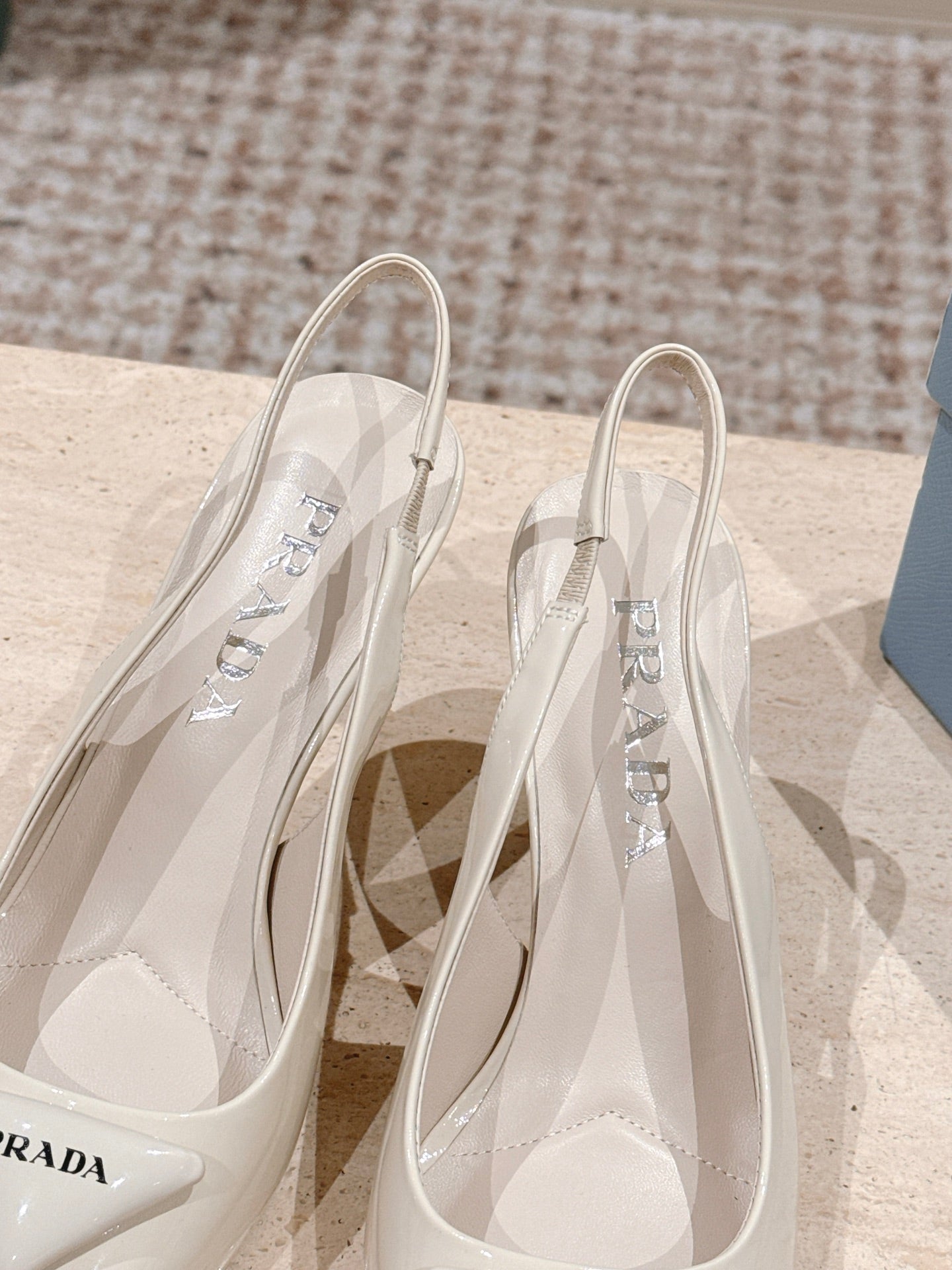 PRADA 26S POINTED-TOE SLINGBACK HEELS 75MM IN LIGHT BEIGE PATENT CALFSKIN