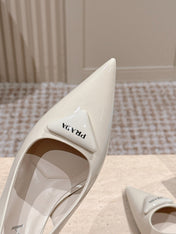 PRADA 26S POINTED-TOE SLINGBACK HEELS 75MM IN LIGHT BEIGE PATENT CALFSKIN