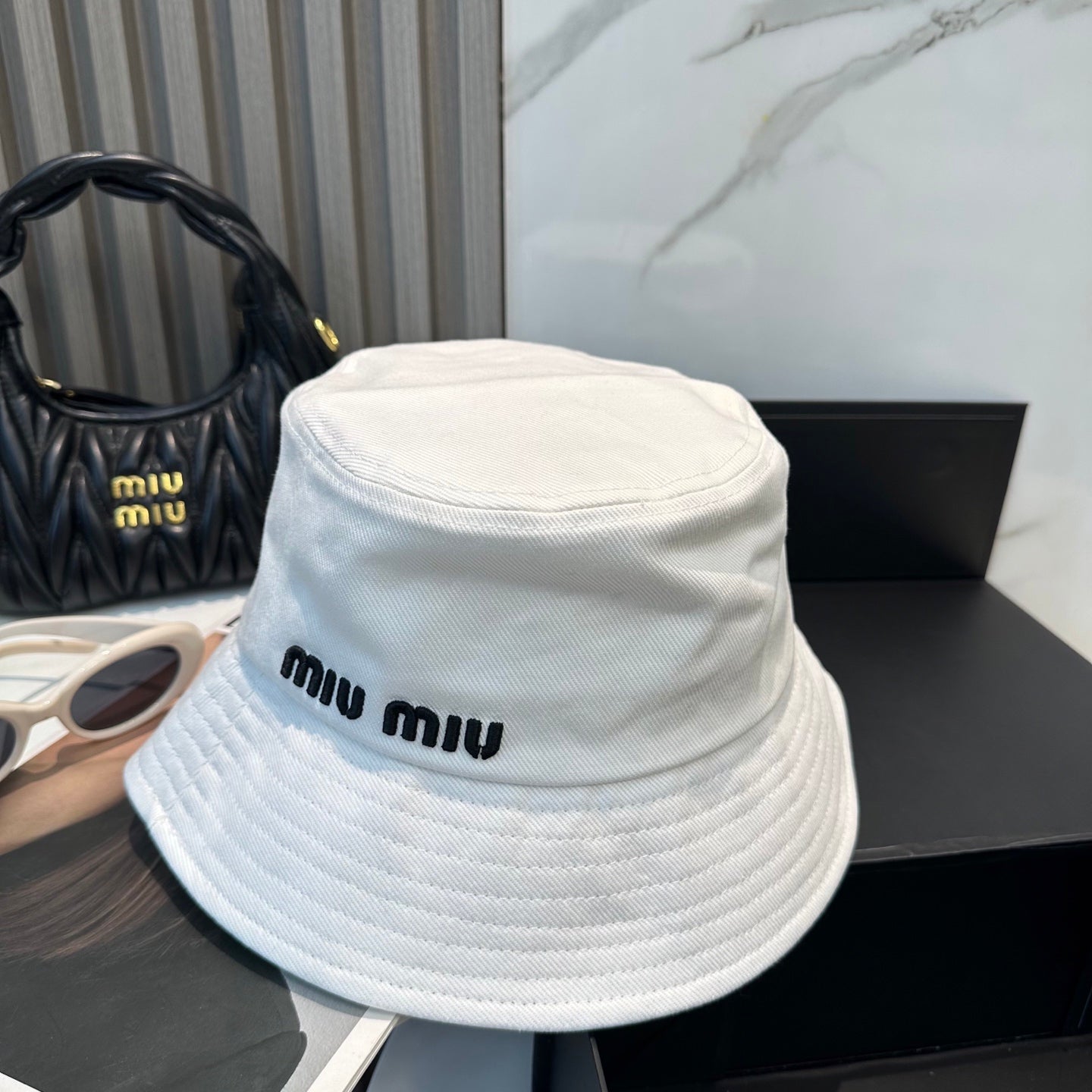 MIUMIU BUCKET HAT STYLE 30