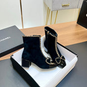 CHANEL 25S HEELED CHAIN BOOTS WITH BOW IN BLACK VELVET GOLD HARDWARE