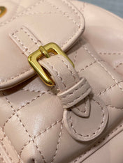SMALL 20 CARO BACKPACK IN PEACH PINK MACROCANNAGE LAMBSKIN
