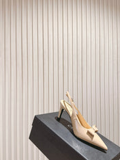 CC HIGH SLINGBACK IN BEIGE LAMBSKIN WITH BOW ATTACHED