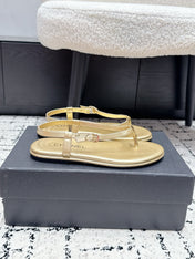 CHANEL 26S THONG SANDALS IN GOLD CALFSKIN WITH GOLD HARDWARE