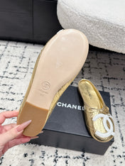 CHANEL 26S FLAT MULES IN GOLD LAMBSKIN