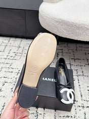 CHANEL 26S HIGH HEELS IN BLACK LAMBSKIN WITH BOW