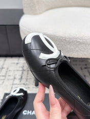 CHANEL 26S HIGH HEELS IN BLACK LAMBSKIN WITH BOW