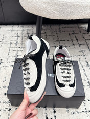 CHANEL 26S LACE-UP SNEAKERS IN WHITE AND BLACK SUEDE STYLE 2
