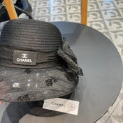 STRAW HAT WITH CHIFFON FLOWER BLACK 672760