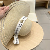 HAT IN BEIGE RAFFIA WIDE-BRIM MIX BIG WHITE BOW