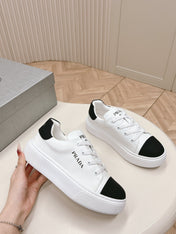 PRA LOGO OUTLET BASIC SNEAKERS WHITE AND BLACK TOE CALFSKIN