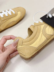 PRADA 26S SNEAKERS IN YELLOW QUILTED NYLON AND SUEDE