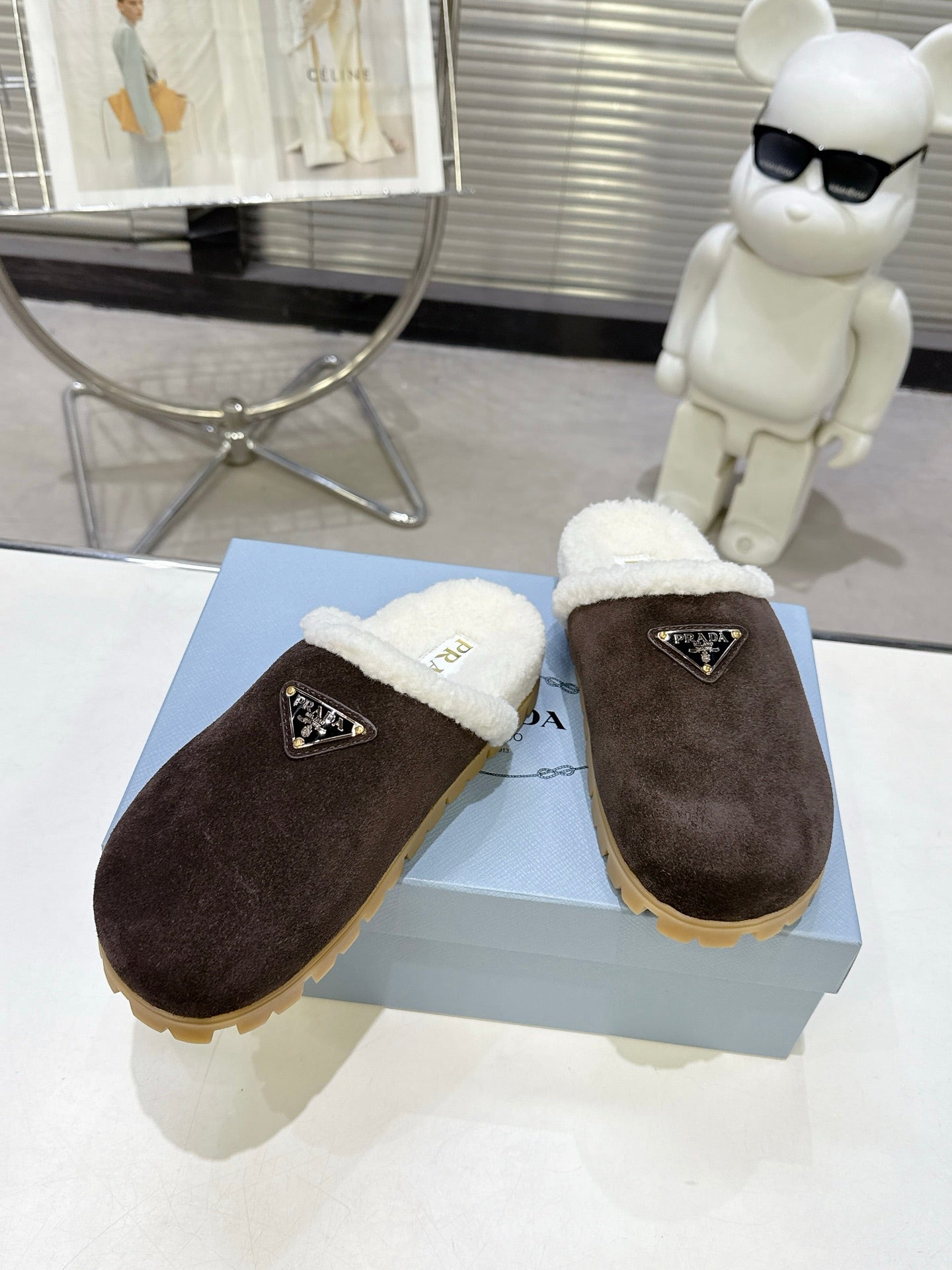 PRADA 25S FUR-LINED MULES IN DARK BROWN SUEDE