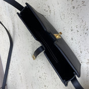 16 STRAP POCHETTE 18 IN BLACK SUPPLE CALFSKIN GOLD HARDWARE