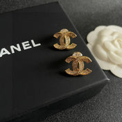 DOUBLE C STUD EARRINGS IN GOLD METAL FULLY DIAMOND