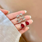 CHANEL 26S DOUBLE C LOGO CRYSTAL & RED TEARDROP DANGLE EARRINGS IN GOLD METAL 629181