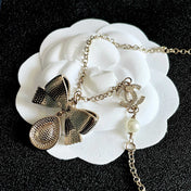 CHANEL 26S DOUBLE C LOGO PEARL BOW & CRYSTAL DROP NECKLACE IN GOLD METAL 629884